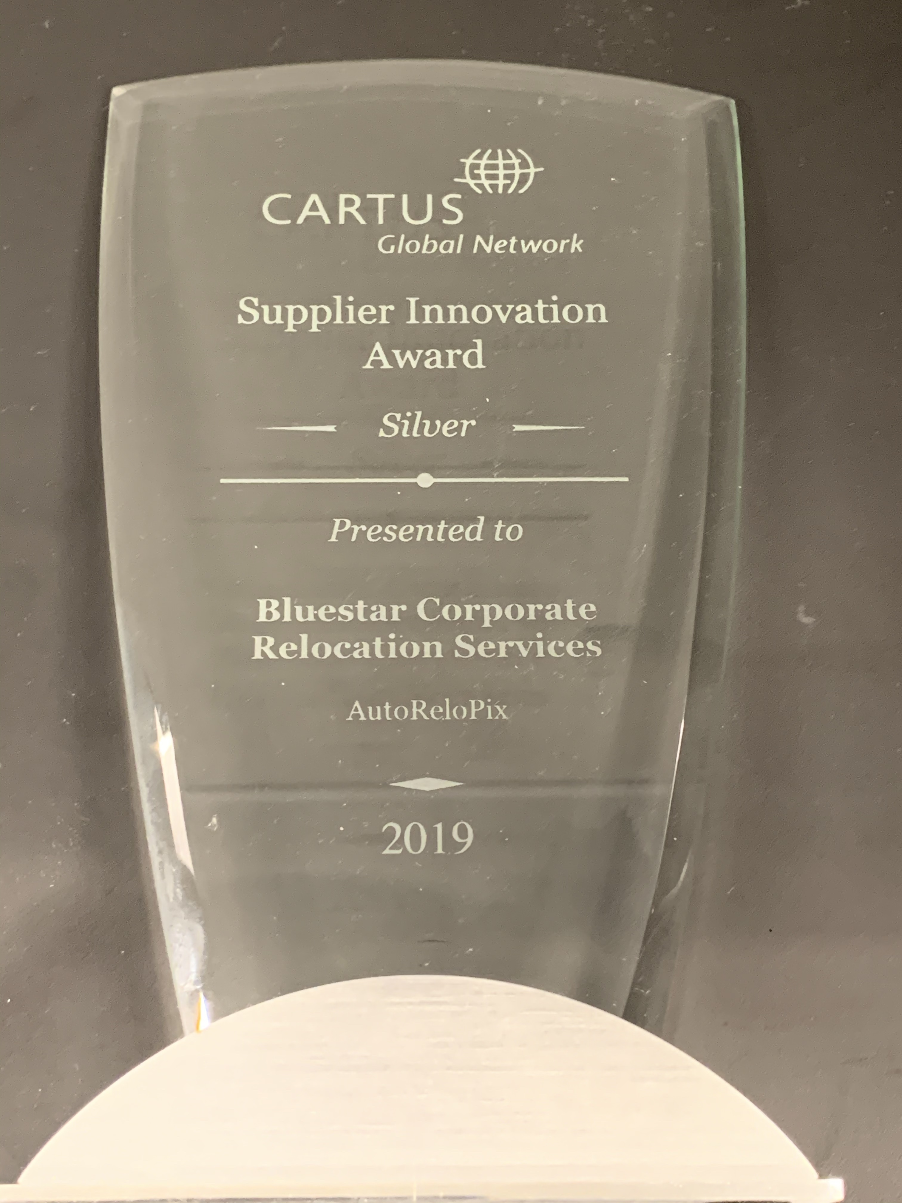 Cartus award clear trophy